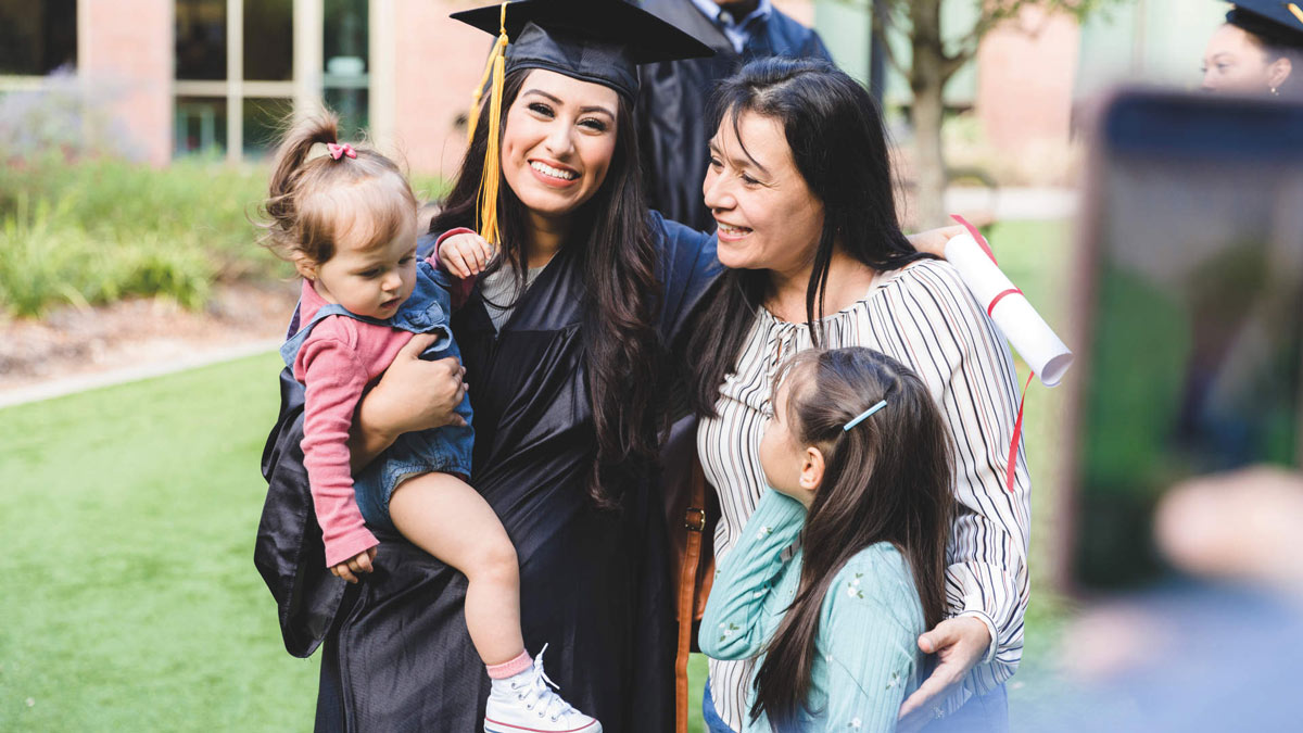 multi-generation family at the daughter's graduation